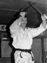 Alan Dollar performing a Sai  kata in Okinawa